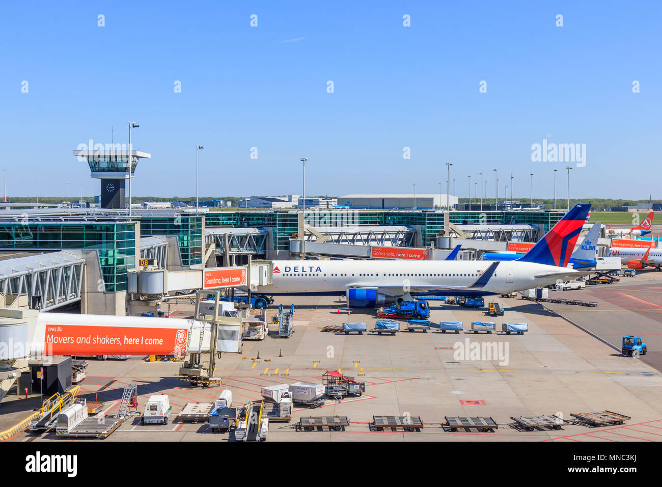 Amsterdam, Netherlands - May 04, 2018: Parked Planes at Schiphol Airport Stock Photo