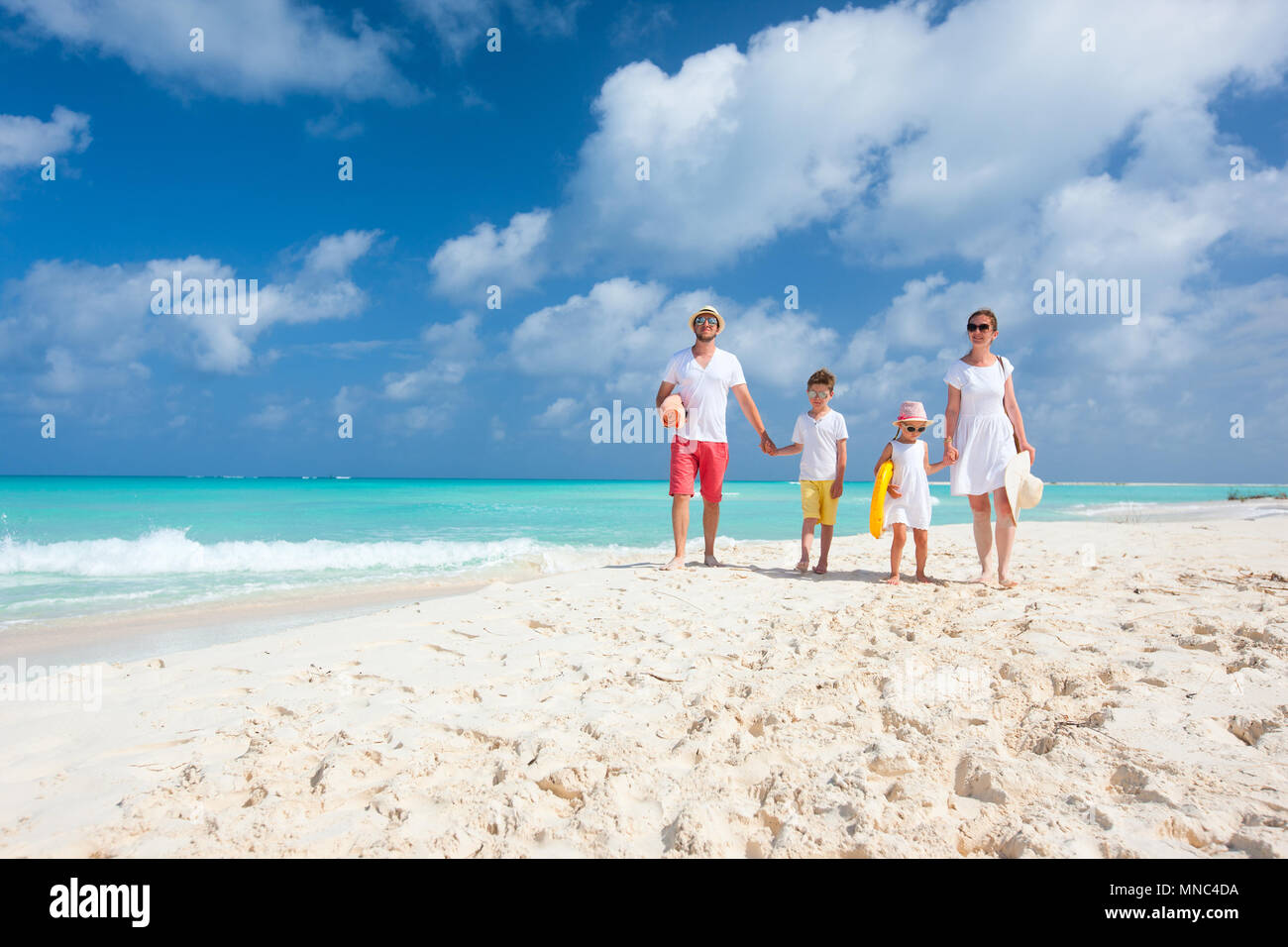 Family four caribbean beach hi-res stock photography and images - Alamy