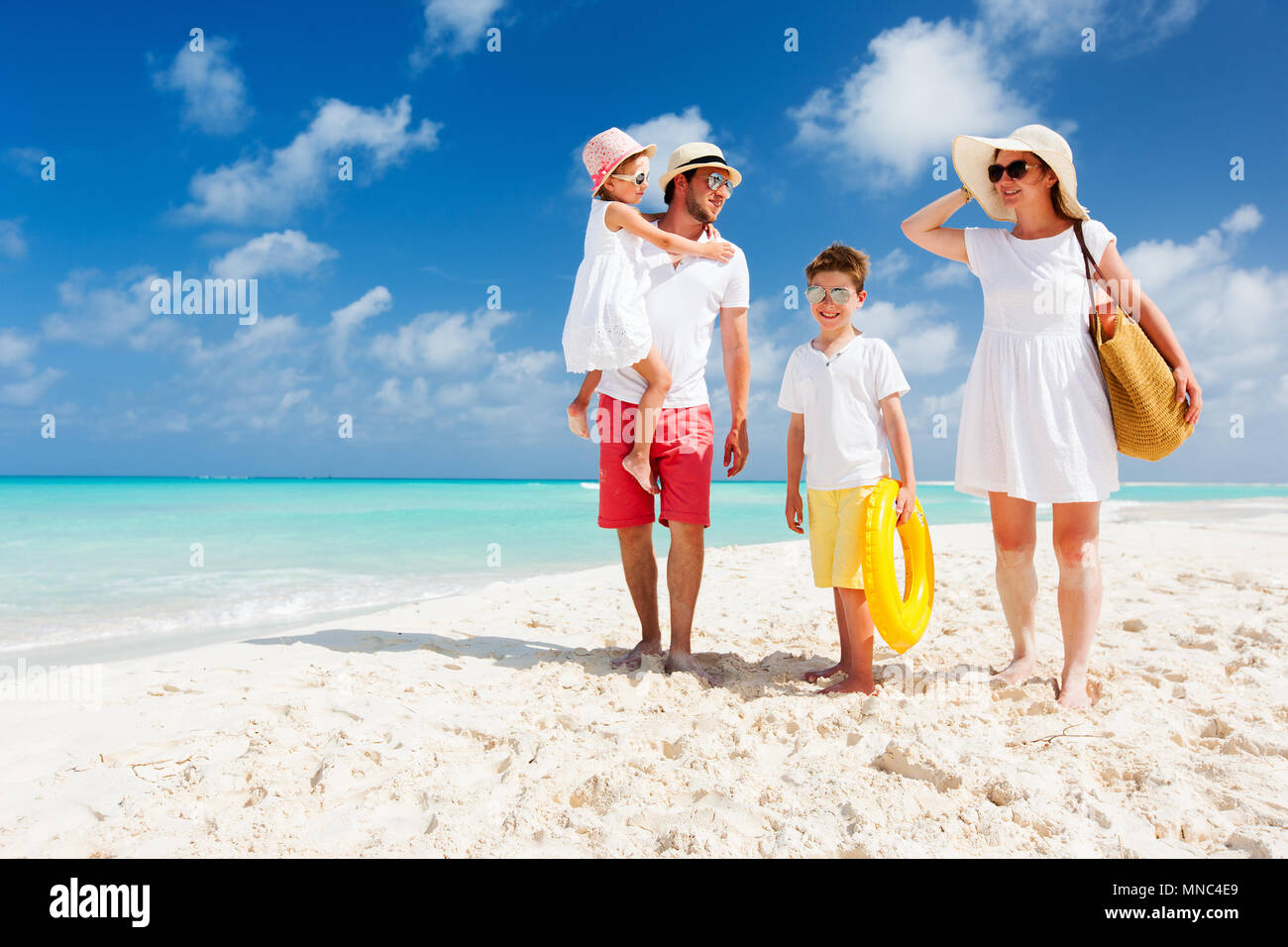 Family beach walking happy summer hi-res stock photography and images ...