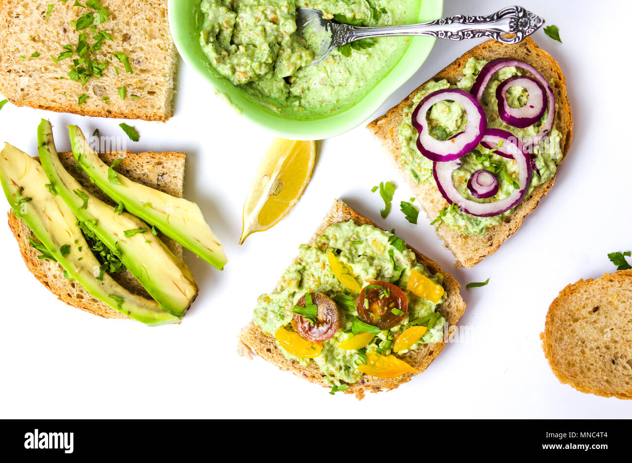 Healthy sandwiches with avocado and vegetables for a diet snack Stock Photo