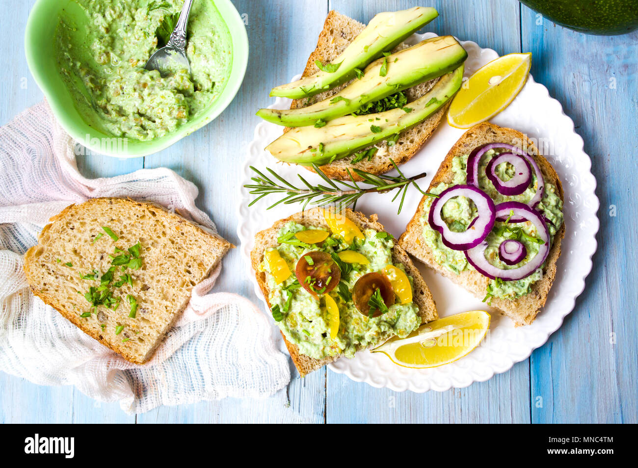 Healthy sandwiches with avocado and vegetable paste for a diet snack Stock Photo