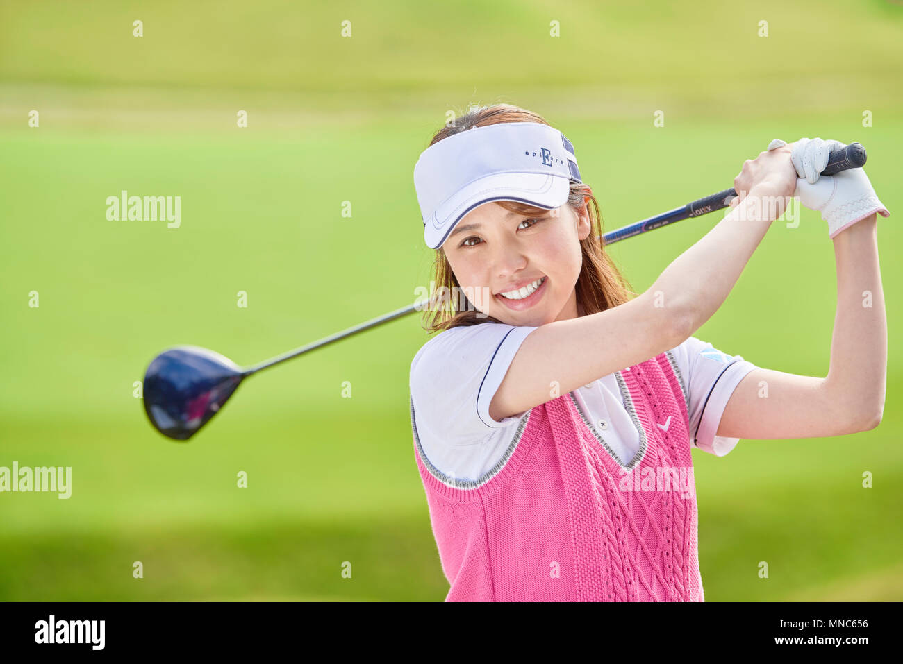 Japanese golf player on course Stock Photo Alamy