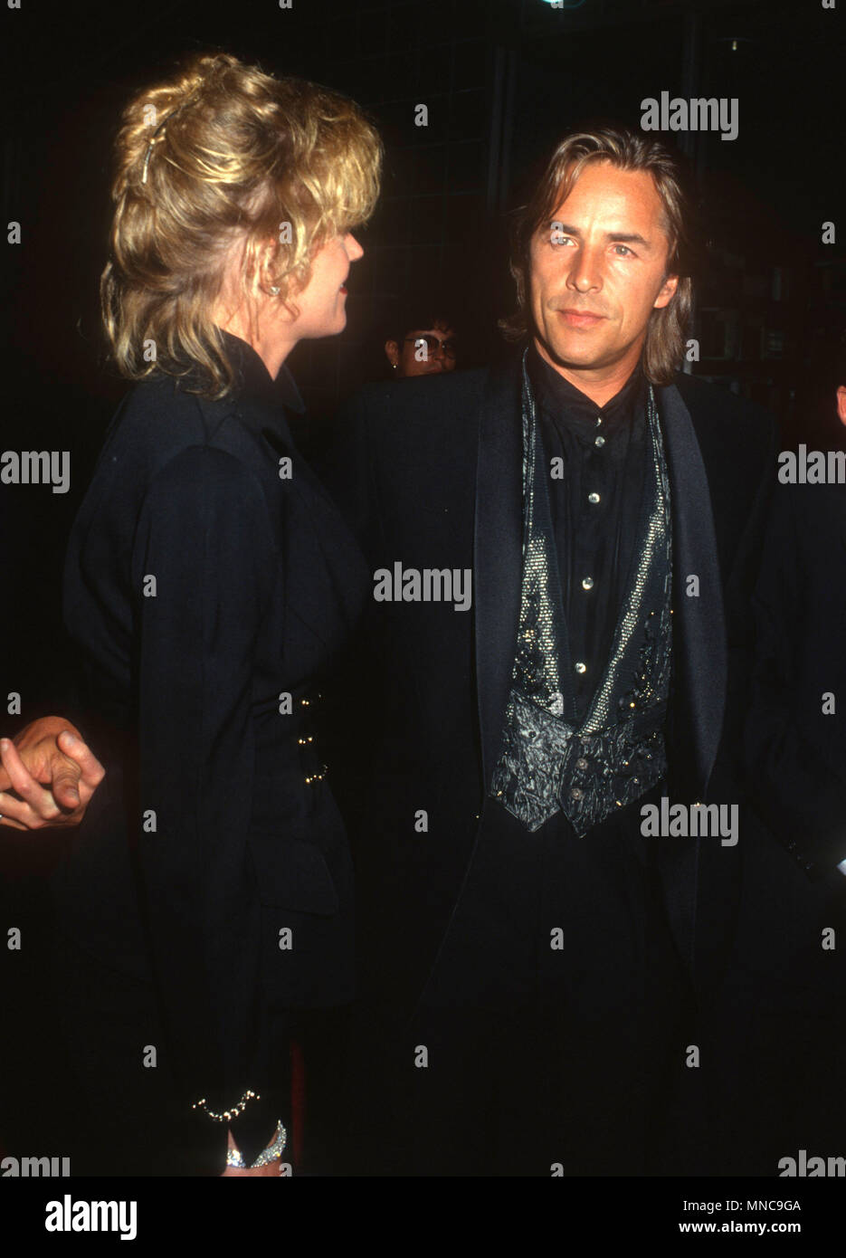 LOS ANGELES, CA - SEPTEMBER 7: (L-R) Actress Melanie Griffith and actor Don Johnson attend Fourth Annual APLA Commitment to Life Benefit on September 7, 1990 at the Wiltern Theater in Los Angeles, California. Photo by Barry King/Alamy Stock Photo Stock Photo
