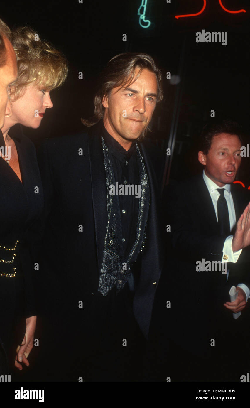 LOS ANGELES, CA - SEPTEMBER 7: (L-R) Actress Melanie Griffith and actor Don Johnson attend Fourth Annual APLA Commitment to Life Benefit on September 7, 1990 at the Wiltern Theater in Los Angeles, California. Photo by Barry King/Alamy Stock Photo Stock Photo