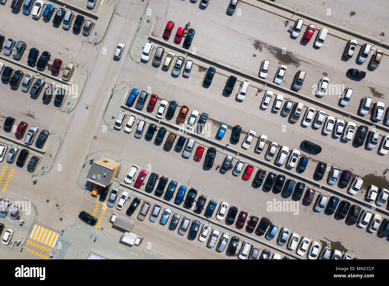 Aerial top view of parking lot with many cars from above ...