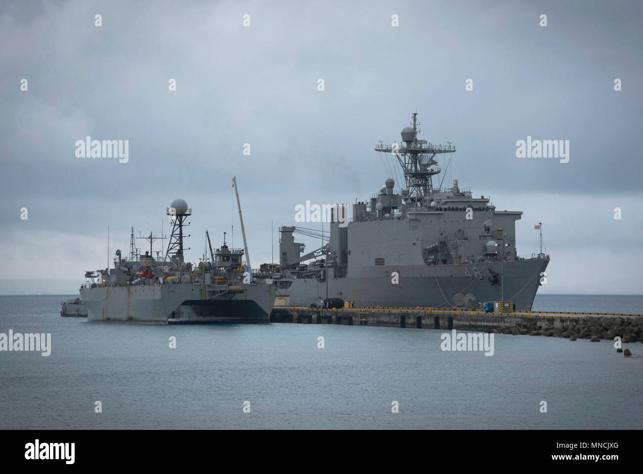 OKINAWA, Japan (March 16, 2018) The dock landing ship USS Ashland (LSD 48) is moored at White Beach Naval Facility in Okinawa, Japan, during the embarkation of the 31st Marine Expeditionary Unit (31st MEU). Ashland is part of the Wasp Expeditionary Strike Group, which is operating in the Indo-Pacific region as part of a regularly scheduled patrol that provides a rapid-response capability in the event of a regional contingency or natural disaster. (U.S. Navy Stock Photo