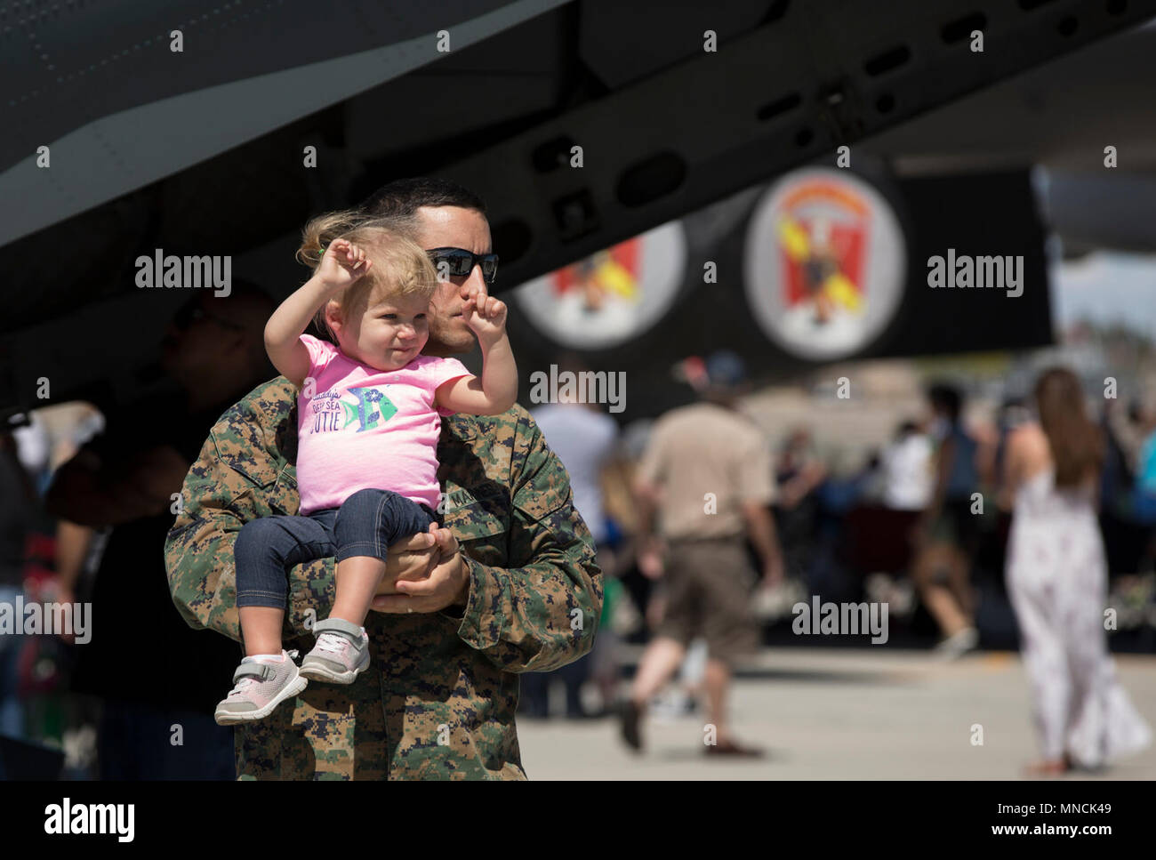 Guests observe the static dispalys at the 2018 Yuma Airshow hosted by Marine Corps Air Station Yuma, Ariz., Saturday, March 17, 2018. The airshow is MCAS Yuma's only military airshow of the year and provides the community an opportunity to see thrilling aerial and ground performers for free while interacting with Marines and Sailors. (U.S. Marine Corps Stock Photo