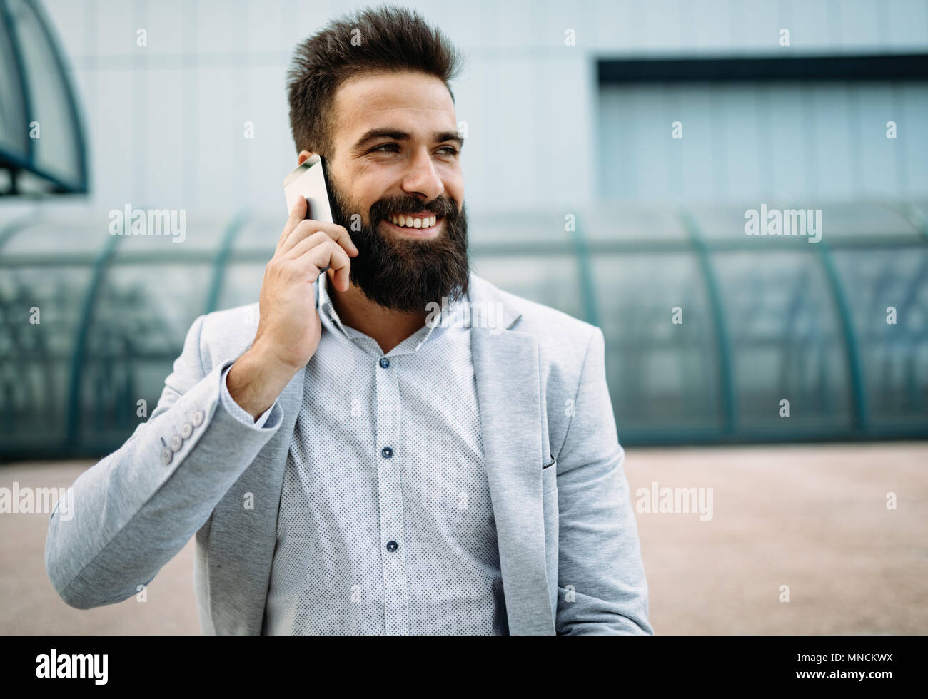 Handsome businessman portrait outdoor Stock Photo - Alamy