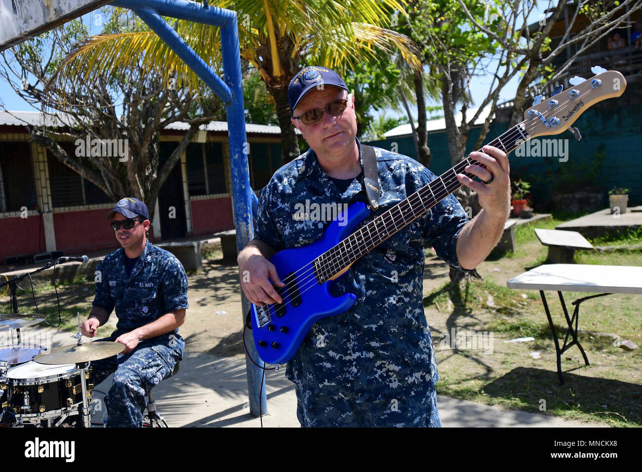 PUERTO CORTES, Honduras (March 18, 2018) Chief Musician Jeremy Ward (r) and Musician 3rd Class Francisco U.S. Navy Fleet Forces Band perform at the School of San Martin during Continuing Promise 2018. U.S. Naval Forces Southern Command/U.S. 4th Fleet has deployed a force to execute Continuing Promise to conduct civil-military operations including humanitarian assistance, training engagements, and medical, dental, and veterinary support in an effort to show U.S. support and commitment to Central and South America. (U.S. Navy Stock Photo