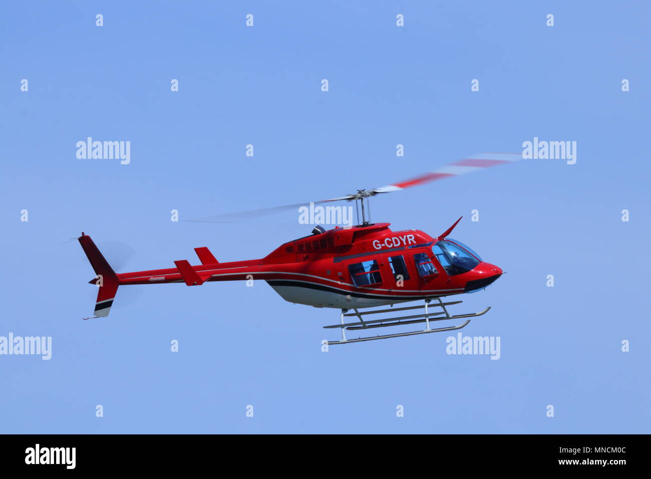 A Bell Ranger helicopter registration G-CDYR flying around Leeds ...