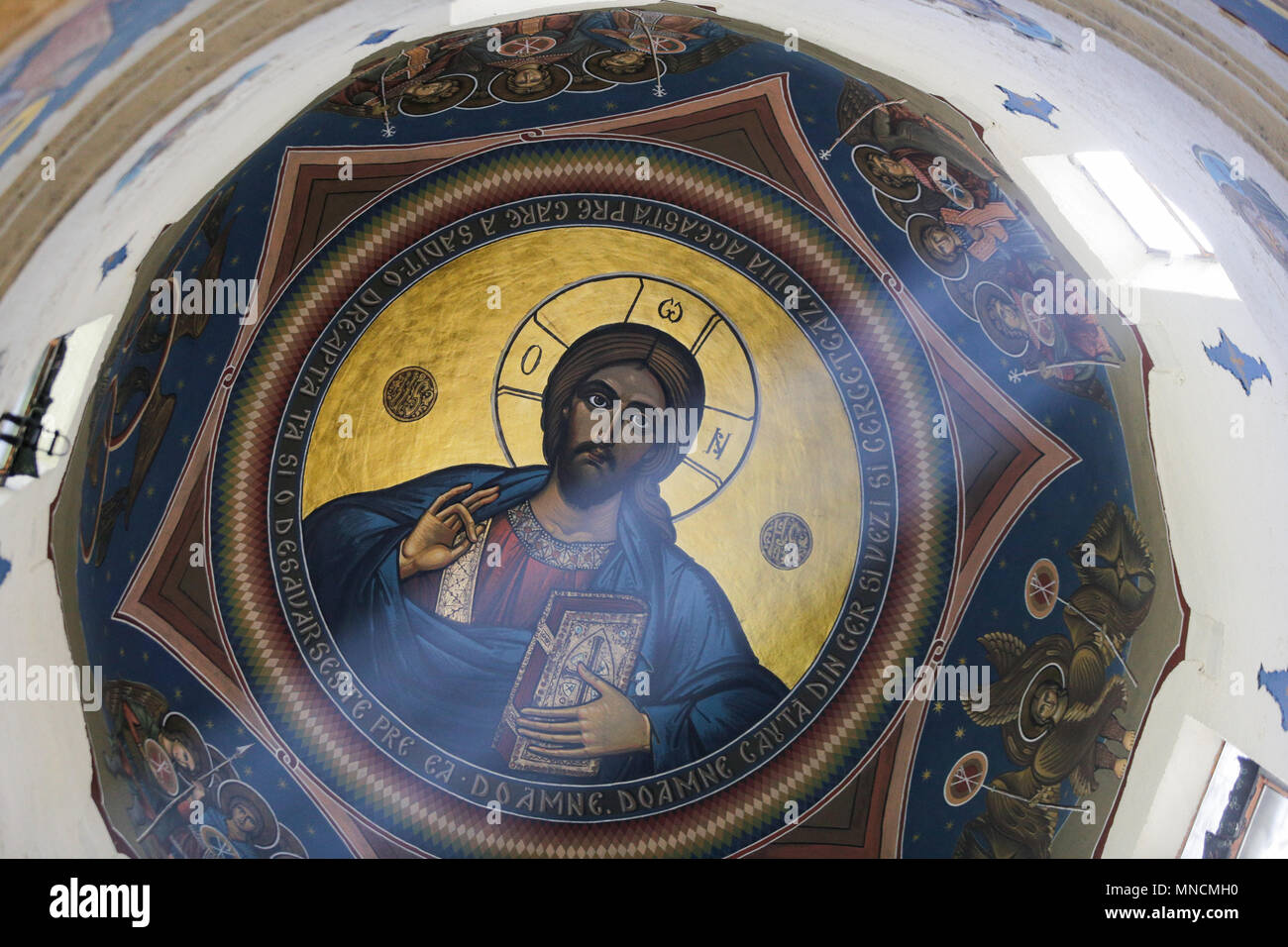 BUCHAREST, ROMANIA - APRIL 27, 2018: Painting of Jesus Pantocratoros, Ruler of the Universe, on the Dome of the Christian Orthodox Church Saint Ioan Stock Photo