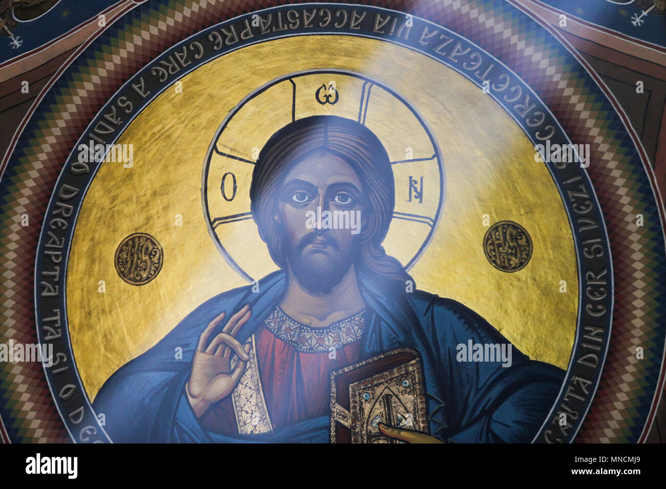 BUCHAREST, ROMANIA - APRIL 27, 2018: Painting of Jesus Pantocratoros, Ruler of the Universe, on the Dome of the Christian Orthodox Church Saint Ioan Stock Photo