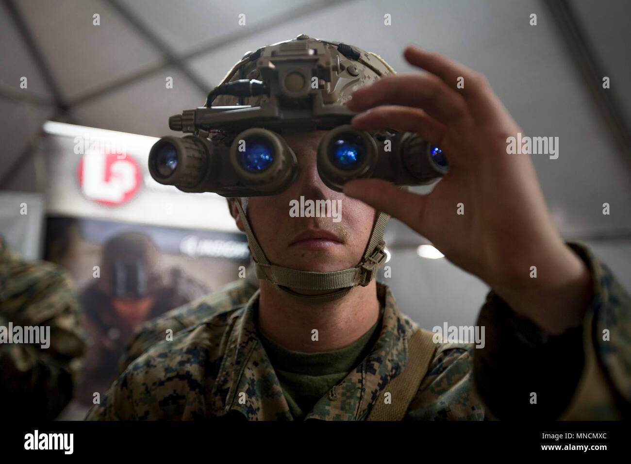 U.S. Marine Corps Lance Cpl. Skyler Stevens, an infantryman with 3rd Battalion, 4th Marine Regiment, 1st Marine Division, uses new night optics technology during Urban Advanced Naval Technology Exercise 2018 (ANTX-18) at Marine Corps Base Camp Pendleton, California, March 19, 2018. The Marines are testing next generation technologies to provide the opportunity to assess the operational utility of emerging technologies and engineering innovations that improve the Marine's survivability, lethality and connectivity in complex urban environments. (U.S. Marine Corps Stock Photo