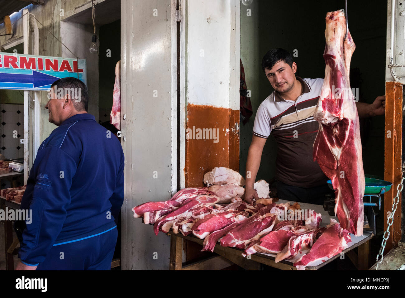 Uzbekistan, surroundings of Bukhara, local market, butcher Stock Photo