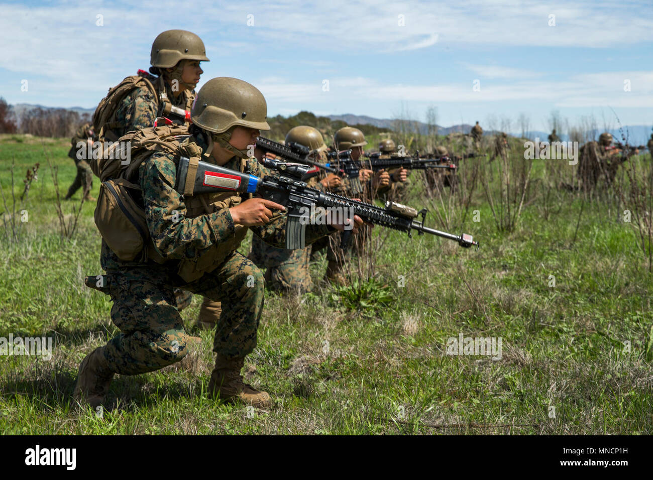U.S. Marines with Golf Company, Marine Combat Training Battalion (MCT), School of Infantry – West, conduct patrolling exercises on Camp Pendleton, Calif., March 20, 2018. Golf Co. is the first integrated male/female MCT company on the West Coast. (U.S. Marine Corps Stock Photo