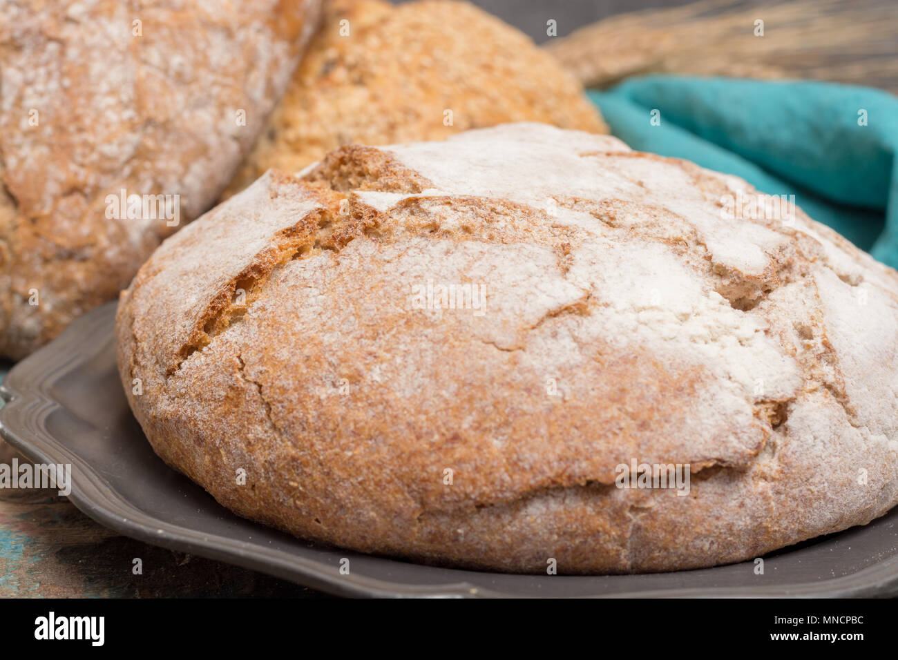 Farmers homemade organic wheat, barley and rye bread in assortment on