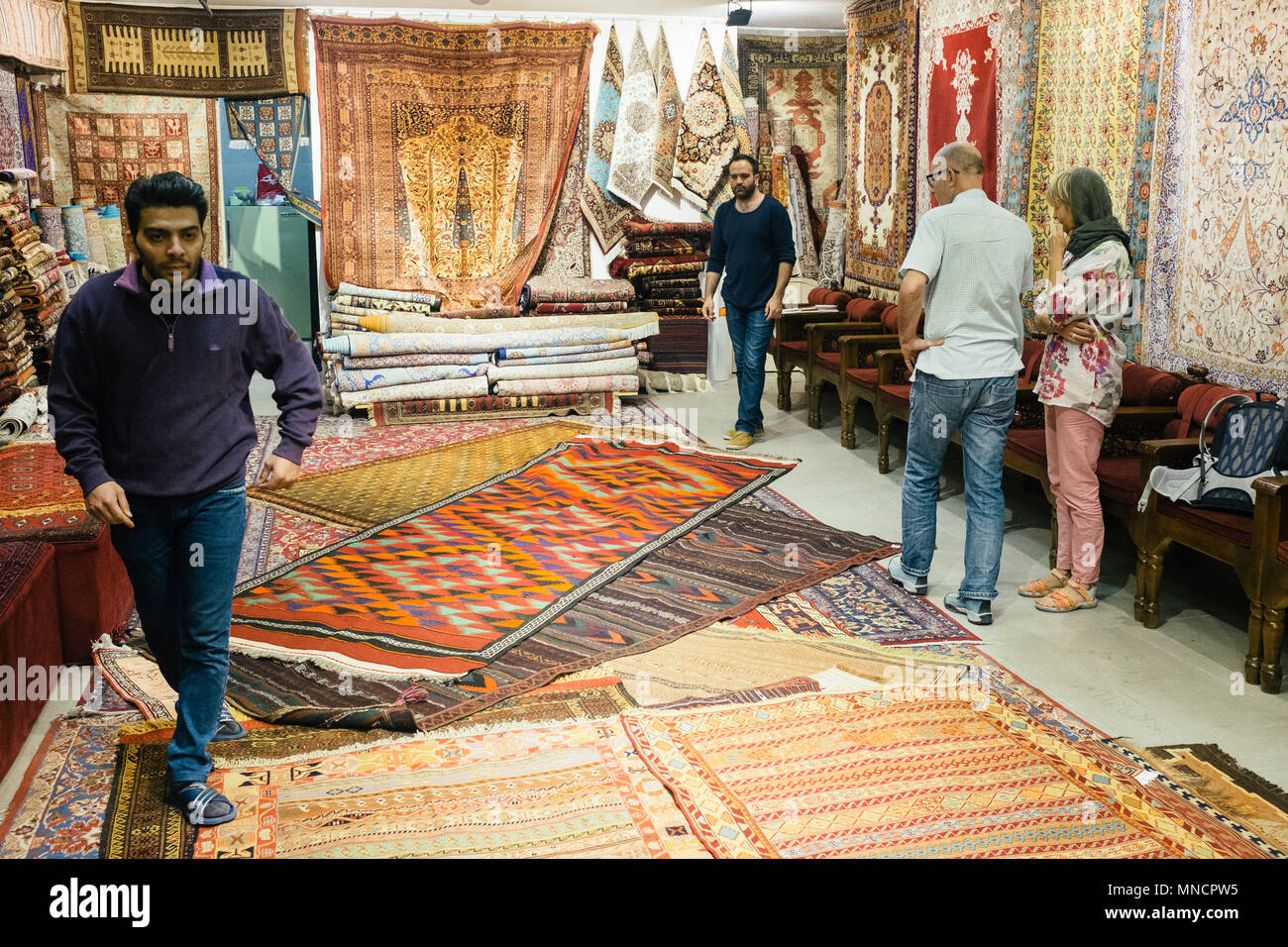 Isfahan, Iran October 14, 2017 Customers at a Persian carpet store