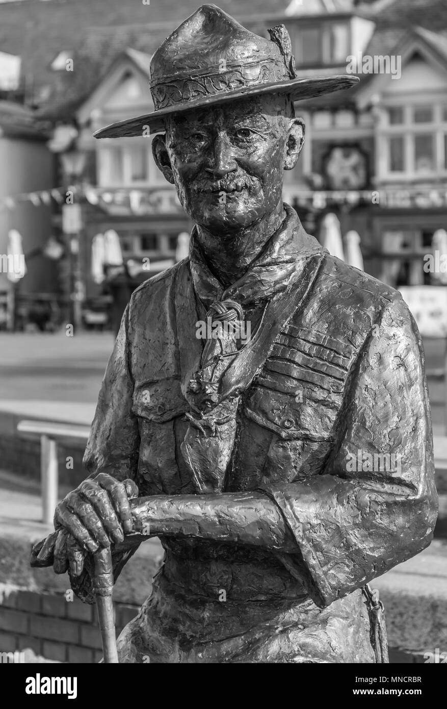 Statue and memorial to Robert Baden Powell on the quayside of Poole harbour who established the Boy Scout movement Stock Photo