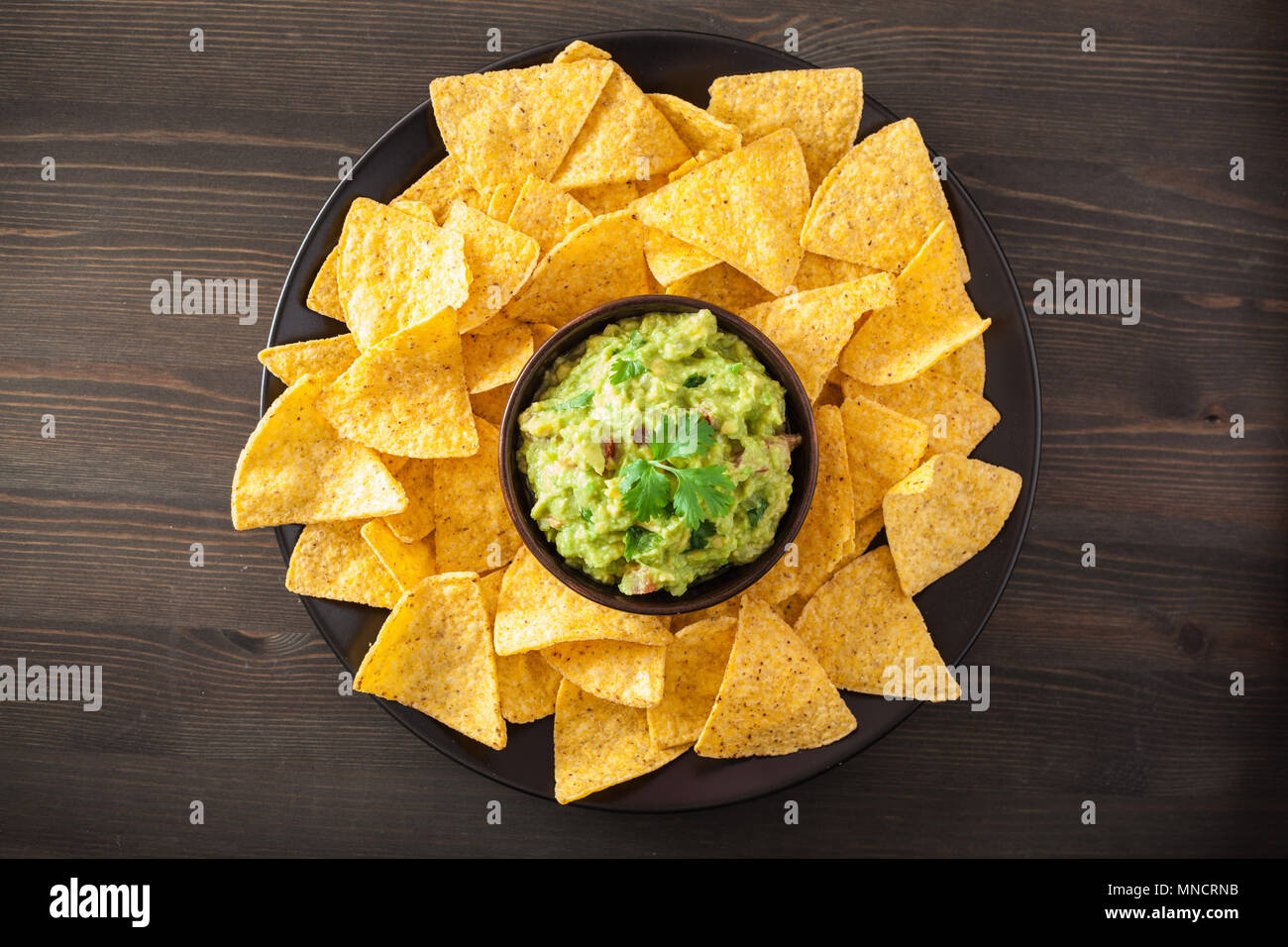 mexican guacamole dip and nachos tortilla chips Stock Photo Alamy