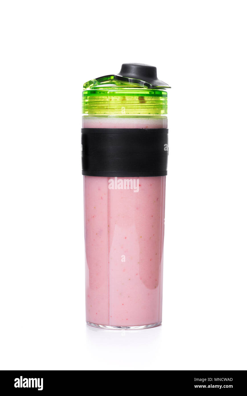 a pink smoothie in a transparent sports bottle, on a white background Stock Photo