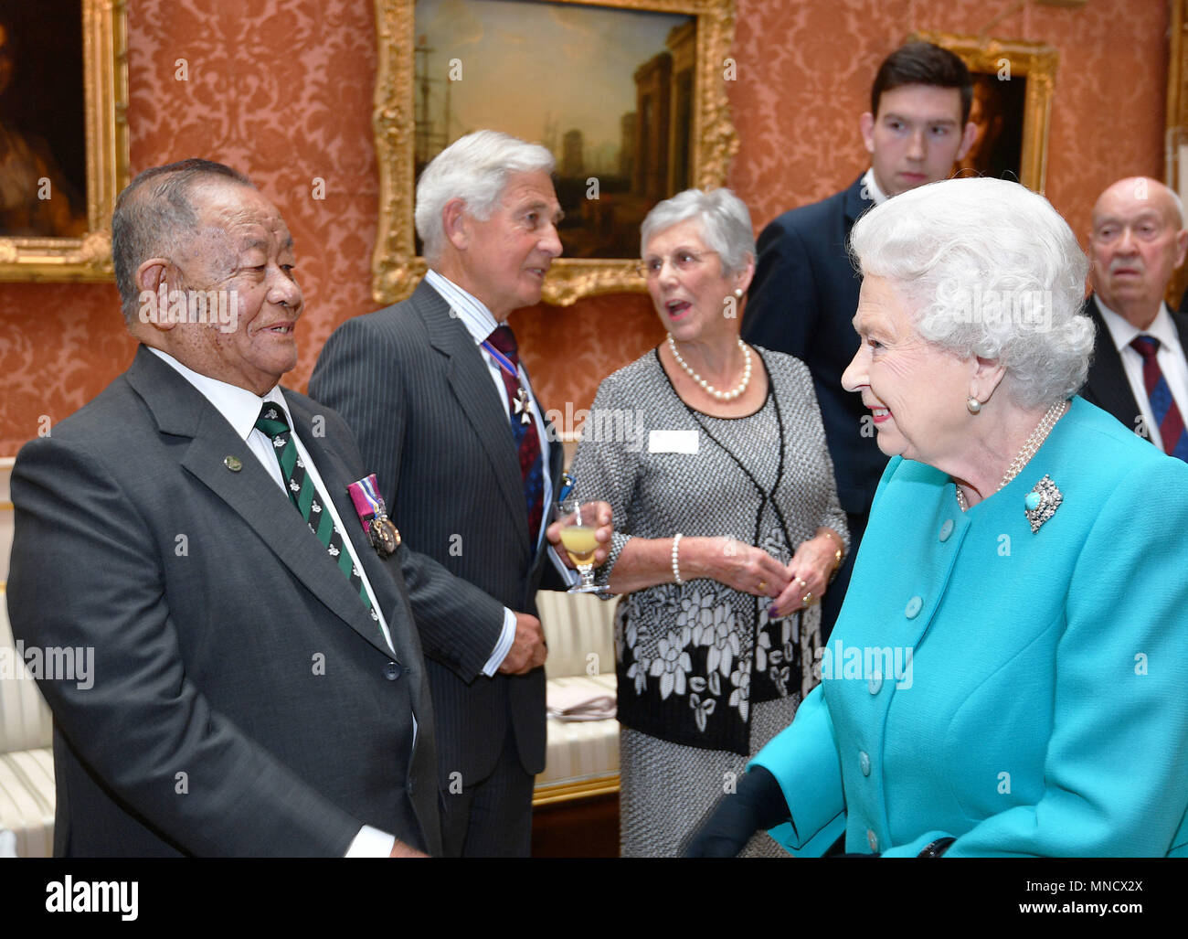 Queen Elizabeth II talks with Capt Rambahadur Limbu VC, at a reception