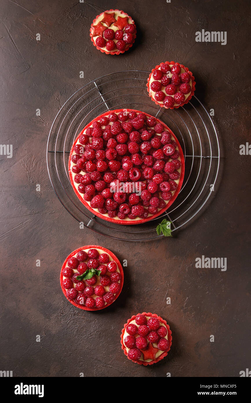 Variety of raspberry tarts Stock Photo Alamy