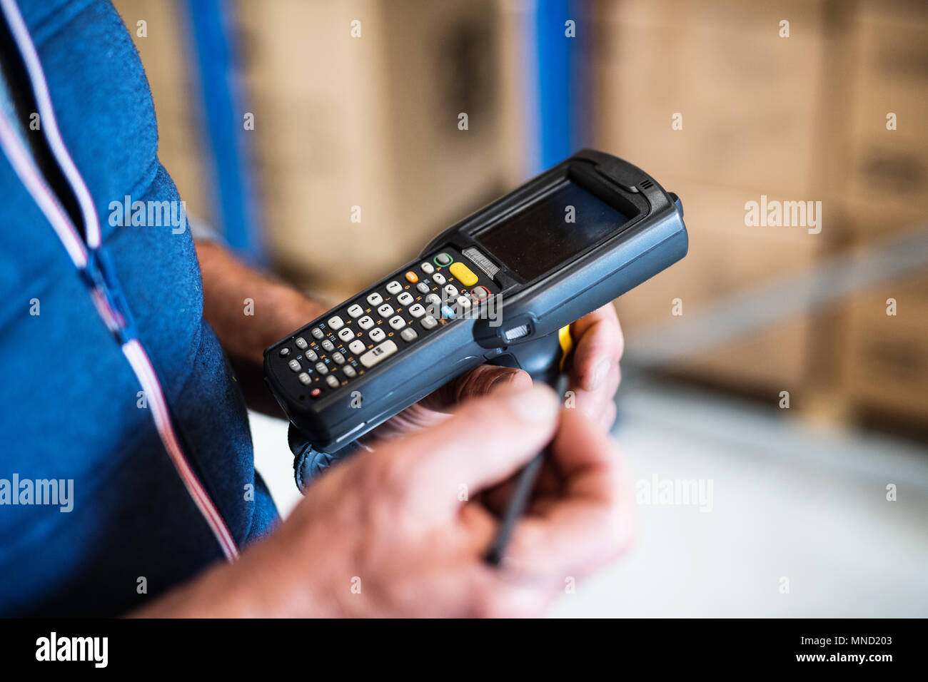 Warehouse manager distribution boxes hi-res stock photography and ...