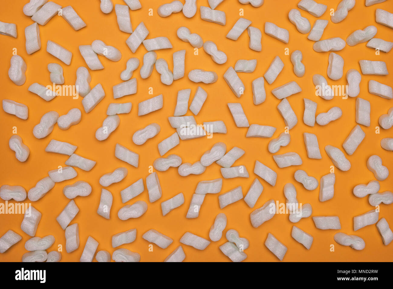 Full frame shot of packing peanuts on yellow background Stock Photo Alamy