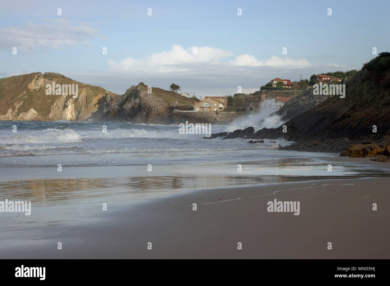 Waves and wind in Comillas, Cantabria Spain. Stock Photo