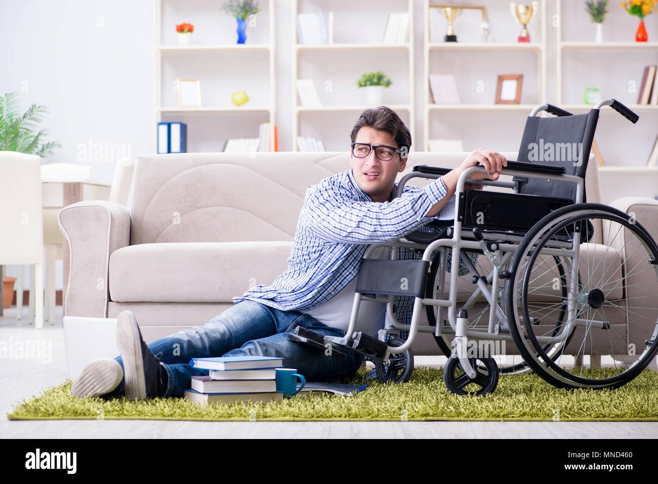 Young student studying at home Stock Photo - Alamy