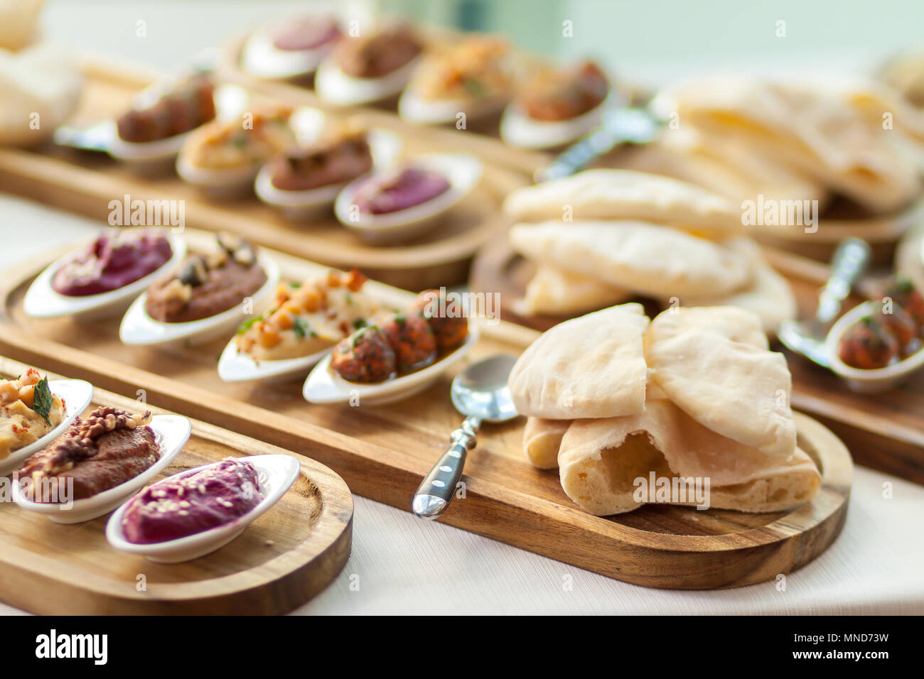 Delicious variety of mediterranean dishes. Antipasti appetizing snacks set. Stock Photo