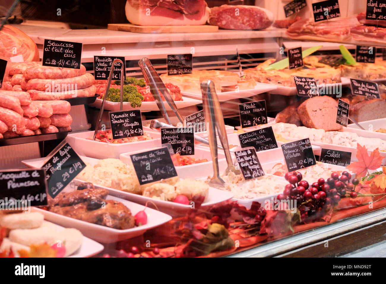 Meats and sausages inside a butchery in Liege, Belgium Stock Photo