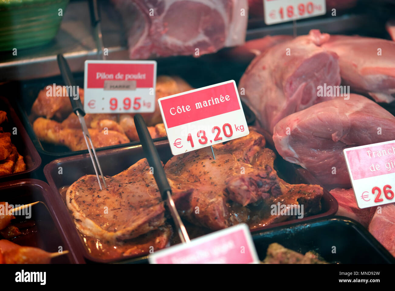 Meats and sausages inside a butchery in Liege, Belgium Stock Photo