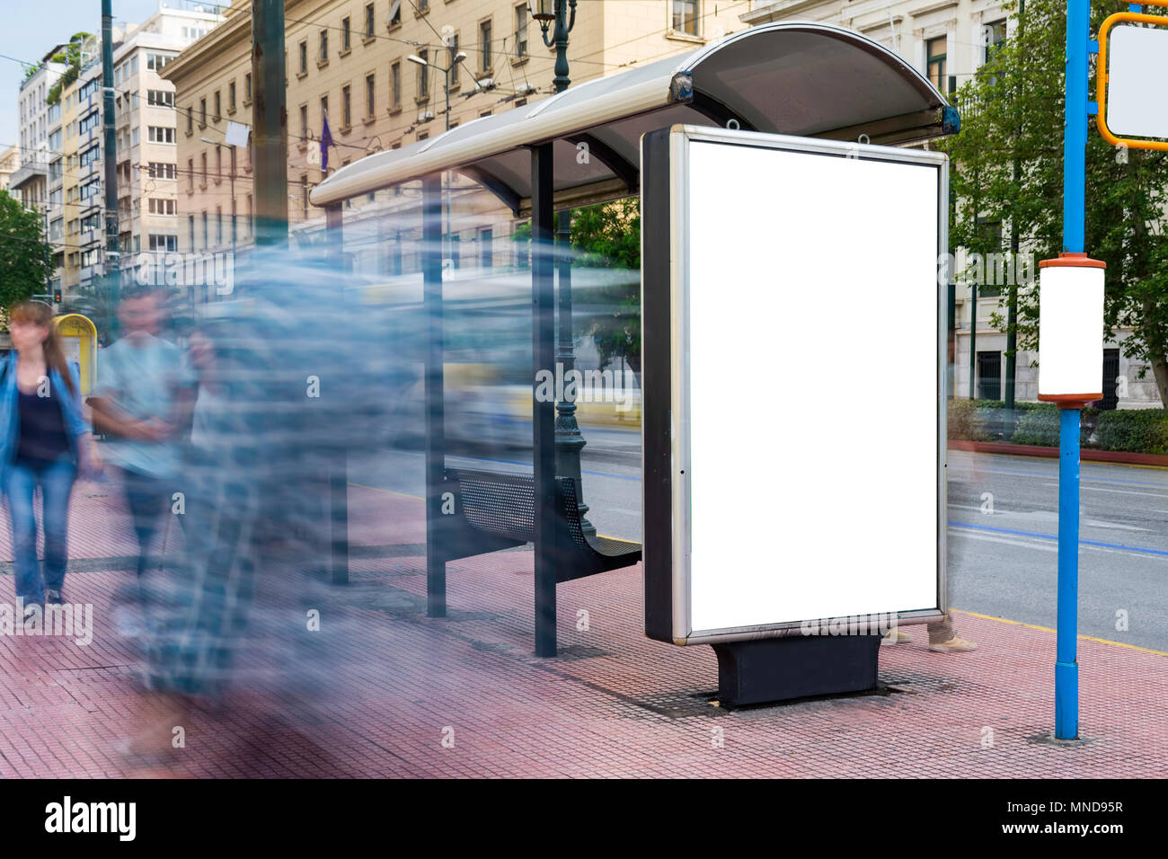 Mock up of blank white vertical bus stop in a city, Athens Stock Photo