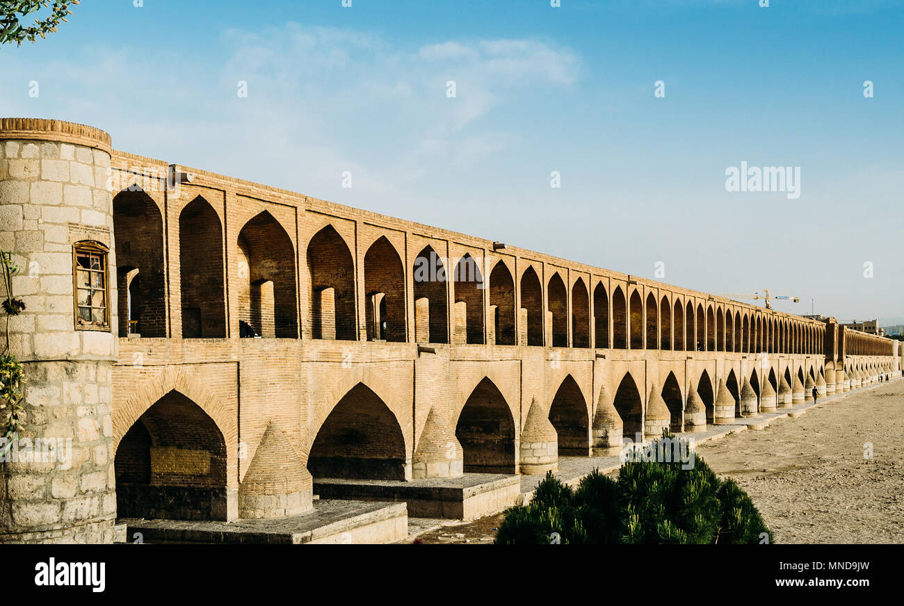 Early 17th c, Si-o-seh Pol, also known as Allahverdi Khan Bridge, in Isfahan, iran is made up of 33 arches in a row and measures 295meters long and 13.75meters wide, crossing the River Zayandeh-Roud Stock Photo