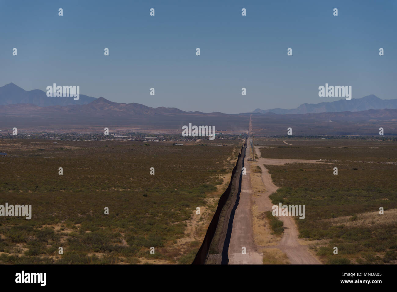 The US and Mexican border in Douglasville, Arizona. On the other side is Agua Prieta, Mexico. Stock Photo