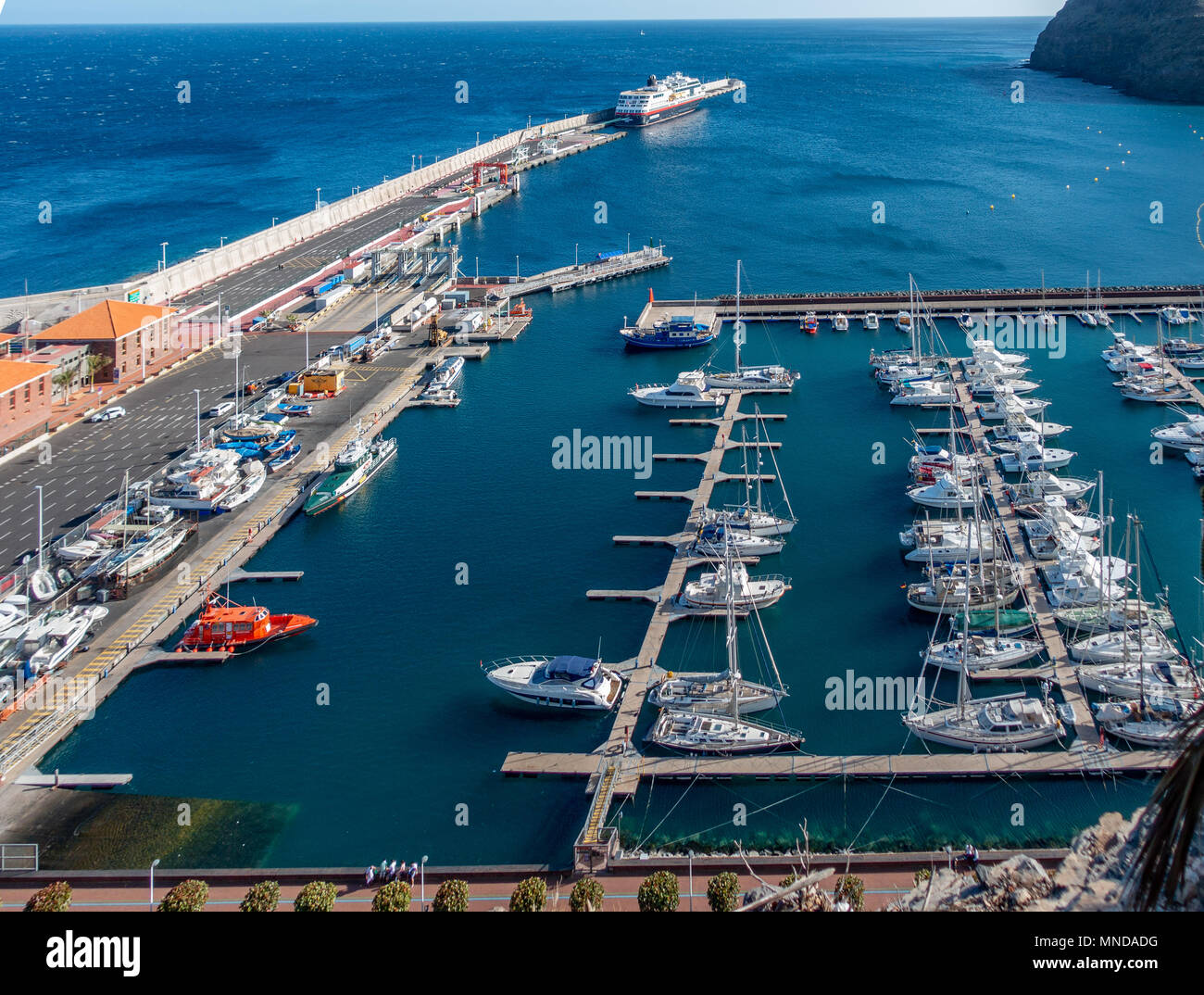 The harbour ferry port and marina at San Sebastian on the island of La Gomera in the Canary Islands Stock Photo