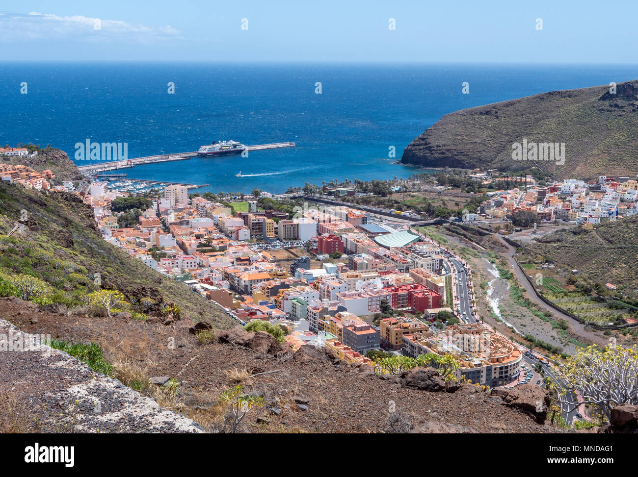 Looking down on the town harbour and ferry port of San Sebastian on the island of La Gomera in the Canary Islands Stock Photo