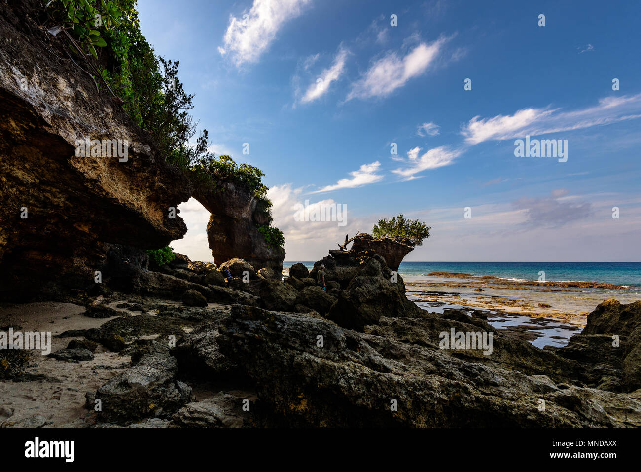 Natural rock bridge at Neil island during low tide, in the Andaman and Nicobar archipelago, India Stock Photo