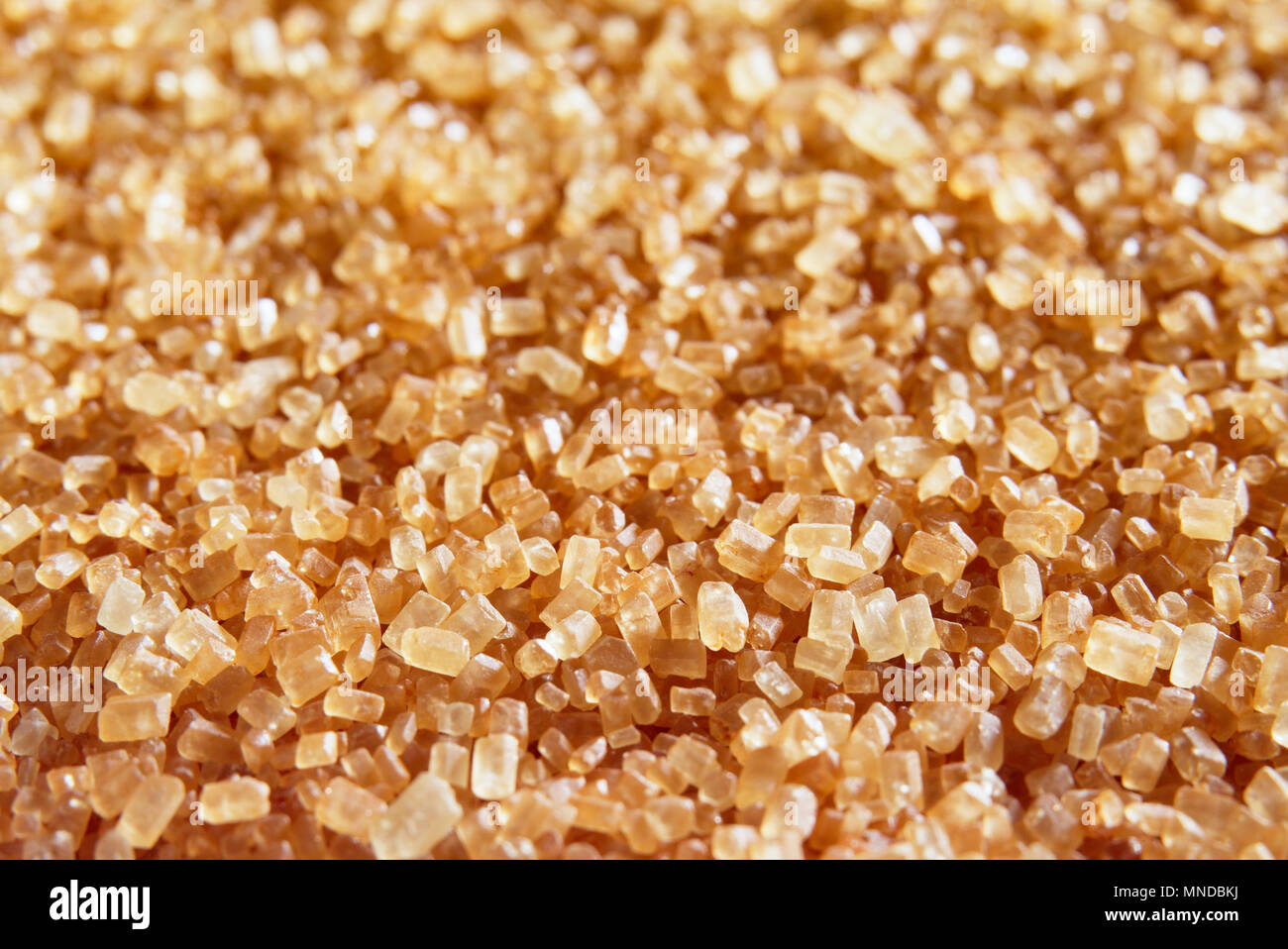Cane brown sugar. Close-up. Stock Photo