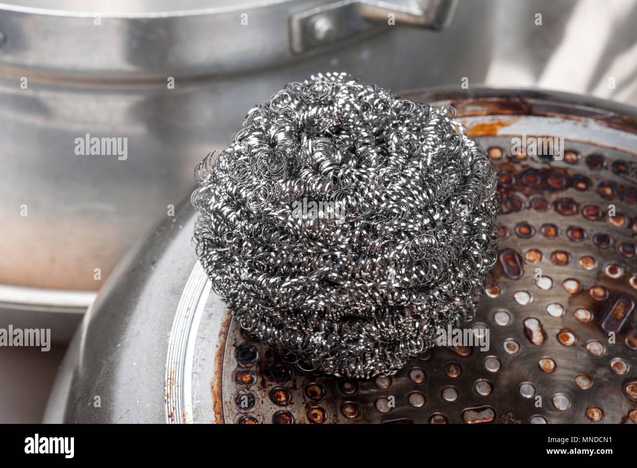 stainless steel scrubber, scouring pad for dish washing Stock Photo Alamy