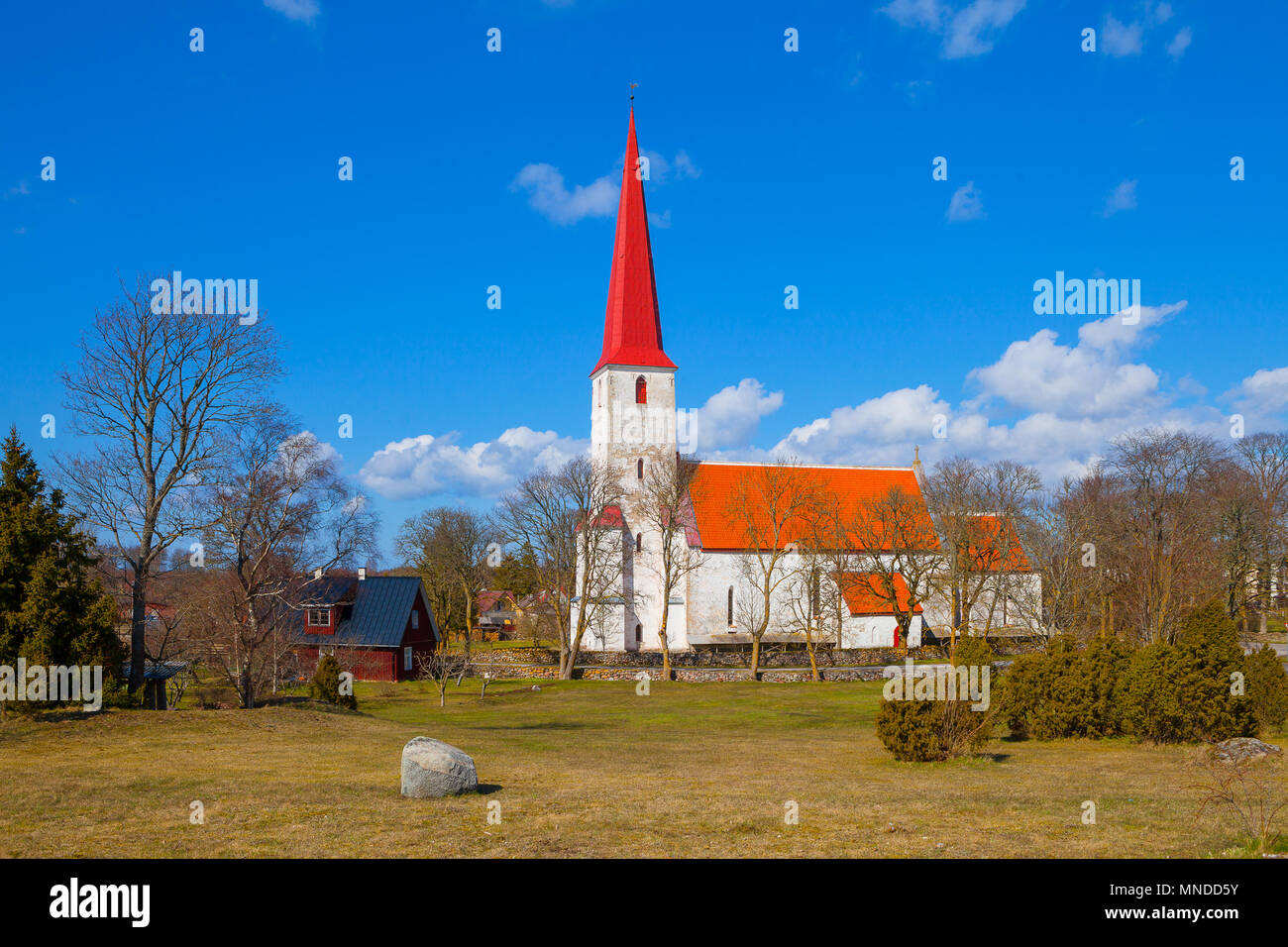 Medieval Lutheran church Kihelkonna, Saaremaa, Estonia. Spring sunny day. Landscape view. Stock Photo