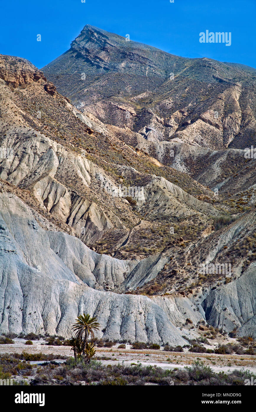 craggy rock face and beautiful mountain peaks in the almeria lunar landscape Stock Photo