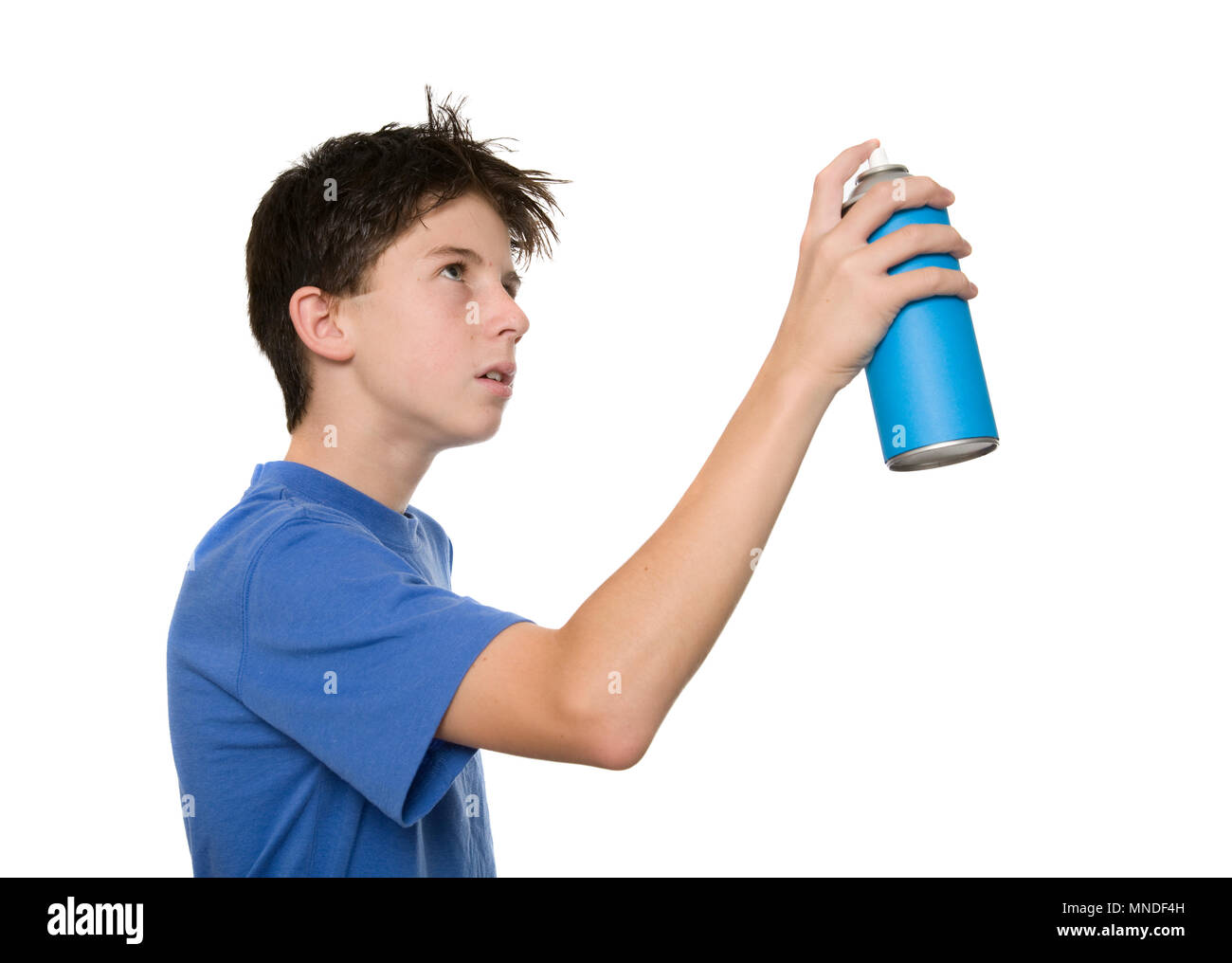 Male teen painting wall spray paint hires stock photography and images