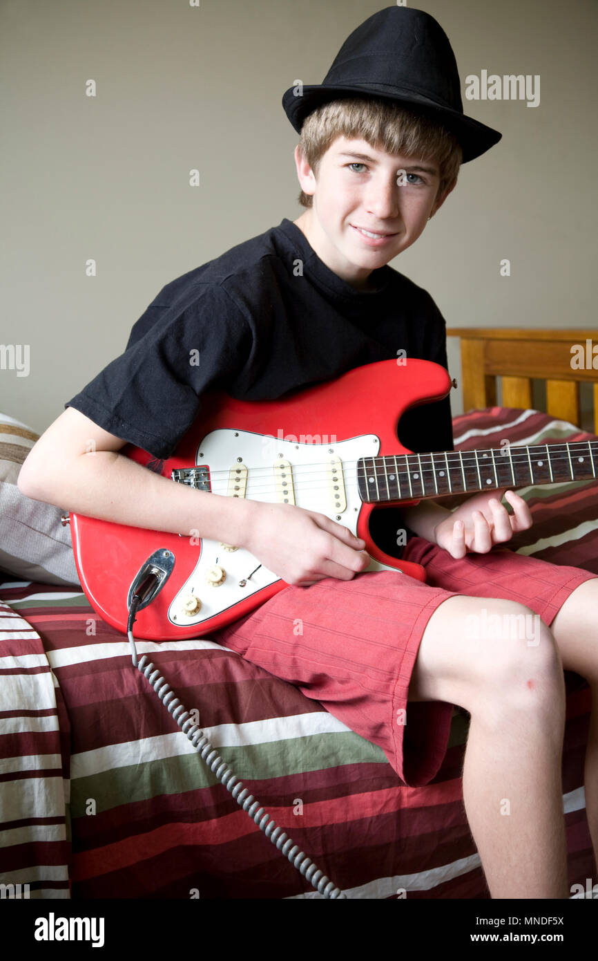 Teenage Boy Guitar Bedroom High Resolution Stock Photography and Images