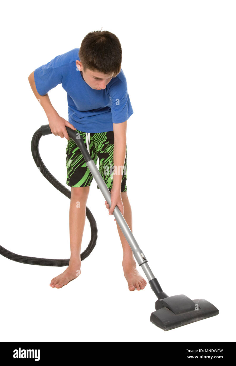 A teenage child vacuuming, isolated on white Stock Photo Alamy