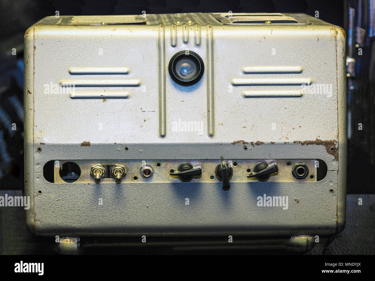 Old tube amplifier in metallic case Stock Photo