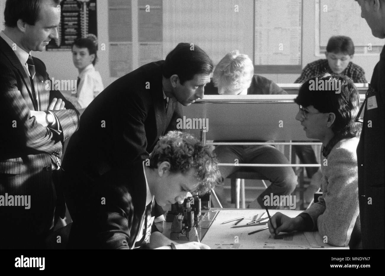 Prince Charles talking to school college students in 1986 Stock Photo