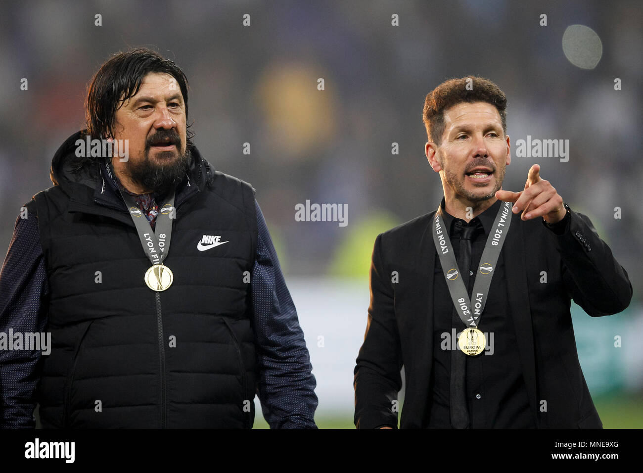 Atletico Madrid Assistant Manager German Burgos and Atletico Madrid Manager  Diego Simeone with their winner's medals