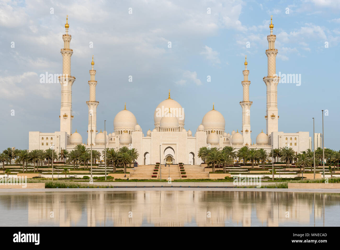 Abu Dhabi, United Arab Emirates. 17, May, 2018.  Sunrise at Sheikh Zayed Grand Mosque in Abu Dhabi, capital city of the United Arab Emirates, on the first day of Ramadan 2018  Mosque is made of white Italian marble and is also home to the final resting place of the Founding Father of the UAE, Zayed bin Sultan Al Nahyan  ©2018 Richard Sharrocks  / Alamy Live News Stock Photo